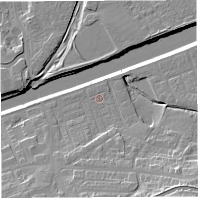 Shaded relief map of the ground around WA42UQ, computed from Environment Agency LiDAR. The ground here sits at about 12 m above sea level and falls 23 m across the surrounding 800 m. Surface water reaching this point runs off ground lying to the south-south-east, 3.3 m higher.