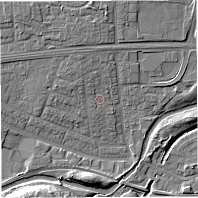 Shaded relief map of the ground around WA51HN, computed from Environment Agency LiDAR. The ground here sits at about 9 m above sea level and falls 11 m across the surrounding 800 m. Surface water reaching this point runs off ground lying to the north, 2.2 m higher.