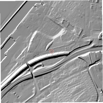 Shaded relief map of the ground around WA74UY, computed from Environment Agency LiDAR. The ground here sits at about 19 m above sea level and falls 40 m across the surrounding 800 m. Surface water reaching this point runs off ground lying to the east, 12.4 m higher.