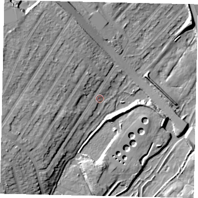 Shaded relief map of the ground around WD247LW, computed from Environment Agency LiDAR. The ground here sits at about 57 m above sea level and falls 14 m across the surrounding 800 m. Surface water reaching this point runs off ground lying to the north-west, 6.8 m higher.