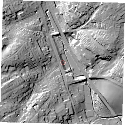 Shaded relief map of the ground around WD77LB, computed from Environment Agency LiDAR. The ground here sits at about 72 m above sea level and falls 35 m across the surrounding 800 m. Surface water reaching this point runs off ground lying to the south-west, 33.6 m higher.