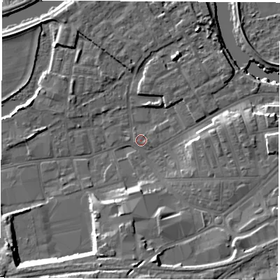 Shaded relief map of the ground around WF101LP, computed from Environment Agency LiDAR. The ground here sits at about 13 m above sea level and falls 15 m across the surrounding 800 m. Surface water reaching this point runs off ground lying to the south-south-west, 12.1 m higher.