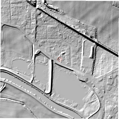 Shaded relief map of the ground around WF102DP, computed from Environment Agency LiDAR. The ground here sits at about 13 m above sea level and falls 20 m across the surrounding 800 m. Surface water reaching this point runs off ground lying to the north-north-east, 2.5 m higher.