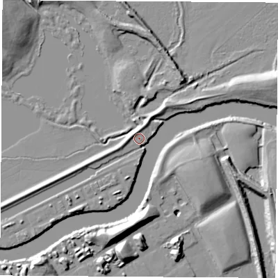 Shaded relief map of the ground around WF102LL, computed from Environment Agency LiDAR. The ground here sits at about 12 m above sea level and falls 17 m across the surrounding 800 m. Surface water reaching this point runs off ground lying to the south, 14.0 m higher.
