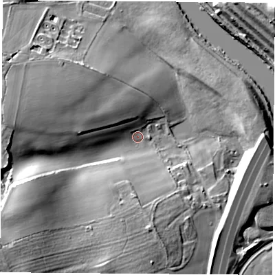 Shaded relief map of the ground around WF102PN, computed from Environment Agency LiDAR. The ground here sits at about 12 m above sea level and falls 26 m across the surrounding 800 m. Surface water reaching this point runs off ground lying to the south-west, 19.5 m higher.