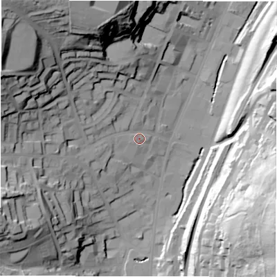 Shaded relief map of the ground around WF132HG, computed from Environment Agency LiDAR. The ground here sits at about 51 m above sea level and falls 66 m across the surrounding 800 m. Surface water reaching this point runs off ground lying to the north-west, 52.0 m higher.