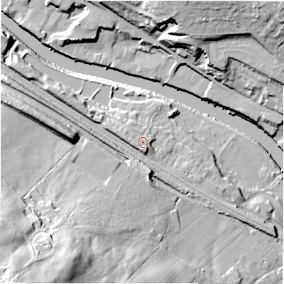 Shaded relief map of the ground around WF148JG, computed from Environment Agency LiDAR. The ground here sits at about 53 m above sea level and falls 62 m across the surrounding 800 m. Surface water reaching this point runs off ground lying to the west-north-west, 1.9 m higher.