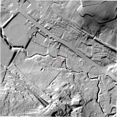 Shaded relief map of the ground around WF156AS, computed from Environment Agency LiDAR. The ground here sits at about 65 m above sea level and falls 57 m across the surrounding 800 m. Surface water reaching this point runs off ground lying to the north-north-east, 46.7 m higher.