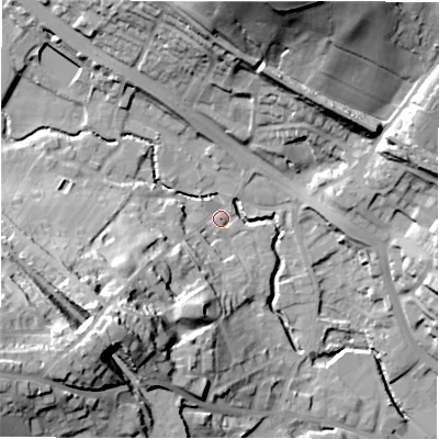 Shaded relief map of the ground around WF156DP, computed from Environment Agency LiDAR. The ground here sits at about 63 m above sea level and falls 42 m across the surrounding 800 m. Surface water reaching this point runs off ground lying to the south-west, 29.3 m higher.