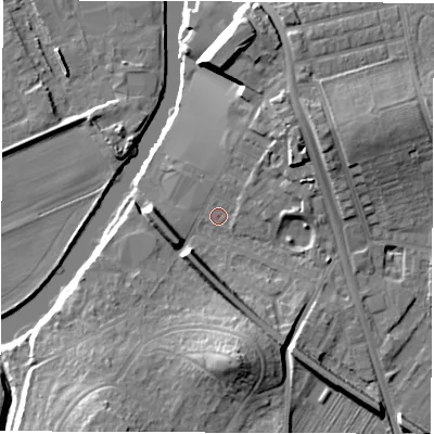 Shaded relief map of the ground around WF15PZ, computed from Environment Agency LiDAR. The ground here sits at about 26 m above sea level and falls 15 m across the surrounding 800 m. Surface water reaching this point runs off ground lying to the south-south-west, 11.8 m higher.