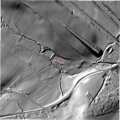 Shaded relief map of the ground around WF44PZ, computed from Environment Agency LiDAR. The ground here sits at about 33 m above sea level and falls 49 m across the surrounding 800 m. Surface water reaching this point runs off ground lying to the north, 12.6 m higher.