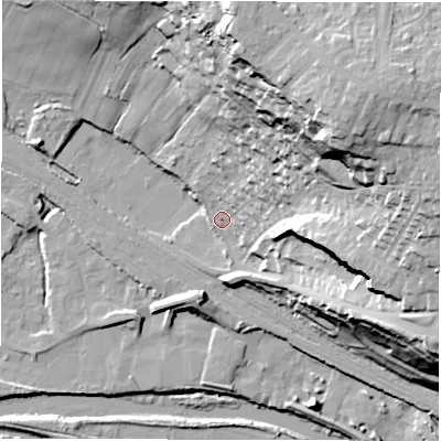 Shaded relief map of the ground around WF46AJ, computed from Environment Agency LiDAR. The ground here sits at about 35 m above sea level and falls 52 m across the surrounding 800 m. Surface water reaching this point runs off ground lying to the north-east, 49.4 m higher.