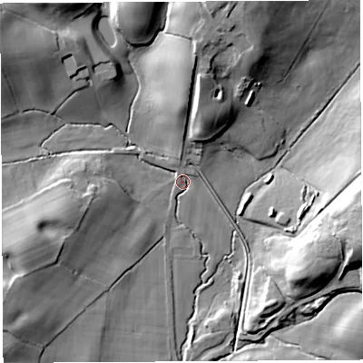Shaded relief map of the ground around WN12XL, computed from Environment Agency LiDAR. The ground here sits at about 67 m above sea level and falls 26 m across the surrounding 800 m. Surface water reaching this point runs off ground lying to the north, 18.4 m higher.