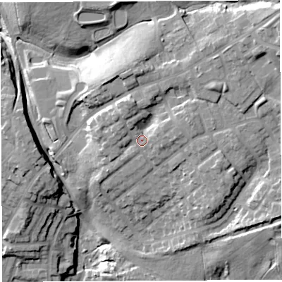 Shaded relief map of the ground around WN21AA, computed from Environment Agency LiDAR. The ground here sits at about 69 m above sea level and falls 35 m across the surrounding 800 m. Surface water reaching this point runs off ground lying to the north-east, 7.8 m higher.