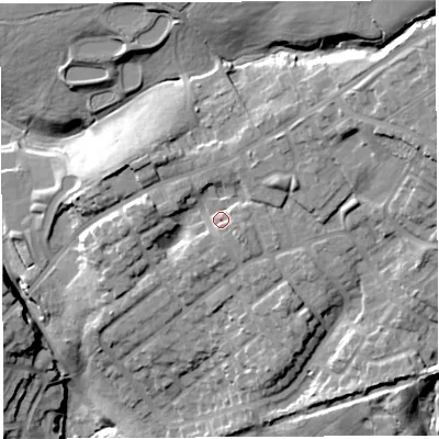 Shaded relief map of the ground around WN21AQ, computed from Environment Agency LiDAR. The ground here sits at about 73 m above sea level and falls 36 m across the surrounding 800 m. Surface water reaching this point runs off ground lying to the south-east, 3.8 m higher.