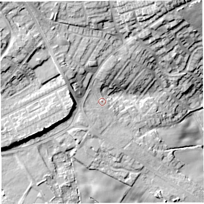 Shaded relief map of the ground around WN21YY, computed from Environment Agency LiDAR. The ground here sits at about 124 m above sea level and falls 29 m across the surrounding 800 m. Surface water reaching this point runs off ground lying to the west, 9.5 m higher.