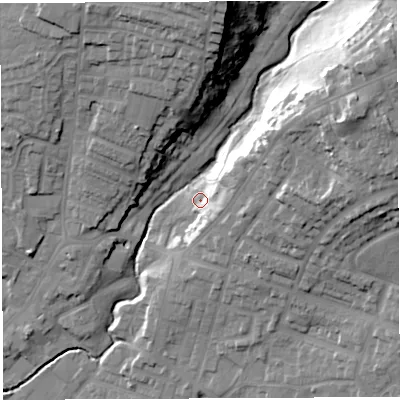 Shaded relief map of the ground around WN23LJ, computed from Environment Agency LiDAR. The ground here sits at about 50 m above sea level and falls 32 m across the surrounding 800 m. Surface water reaching this point runs off ground lying to the east-north-east, 12.8 m higher.