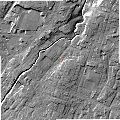 Shaded relief map of the ground around WN23PE, computed from Environment Agency LiDAR. The ground here sits at about 43 m above sea level and falls 25 m across the surrounding 800 m. Surface water reaching this point runs off ground lying to the north-east, 11.6 m higher.