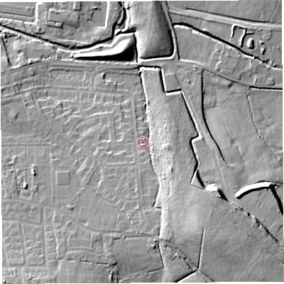 Shaded relief map of the ground around WN25PS, computed from Environment Agency LiDAR. The ground here sits at about 32 m above sea level and falls 17 m across the surrounding 800 m. Surface water reaching this point runs off ground lying to the south-east, 12.2 m higher.