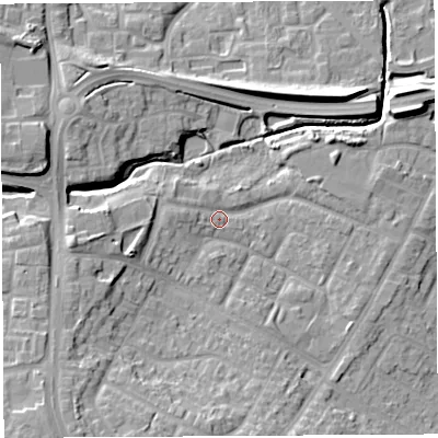 Shaded relief map of the ground around WN35HY, computed from Environment Agency LiDAR. The ground here sits at about 32 m above sea level and falls 14 m across the surrounding 800 m. Surface water reaching this point runs off ground lying to the south-west, 10.7 m higher.