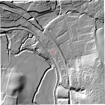 Shaded relief map of the ground around WN69ET, computed from Environment Agency LiDAR. The ground here sits at about 23 m above sea level and falls 37 m across the surrounding 800 m. Surface water reaching this point runs off ground lying to the south-east, 32.6 m higher.