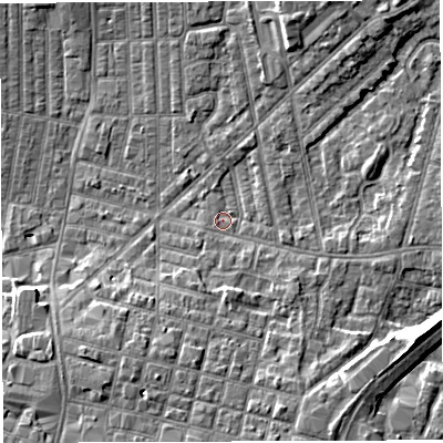 Shaded relief map of the ground around WN71EX, computed from Environment Agency LiDAR. The ground here sits at about 25 m above sea level and falls 8 m across the surrounding 800 m. Surface water reaching this point runs off ground lying to the south-south-east, 4.7 m higher.