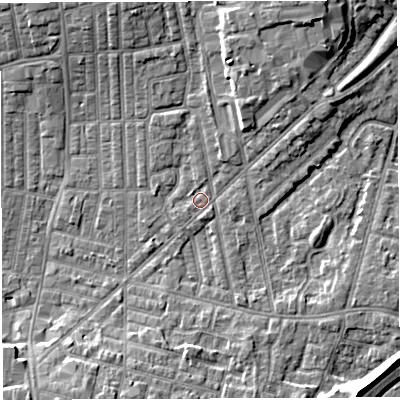 Shaded relief map of the ground around WN71HE, computed from Environment Agency LiDAR. The ground here sits at about 25 m above sea level and falls 8 m across the surrounding 800 m. Surface water reaching this point runs off ground lying to the north-north-east, 3.9 m higher.