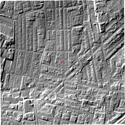 Shaded relief map of the ground around WN71NB, computed from Environment Agency LiDAR. The ground here sits at about 24 m above sea level and falls 6 m across the surrounding 800 m. Surface water reaching this point runs off ground lying to the north, 3.0 m higher.