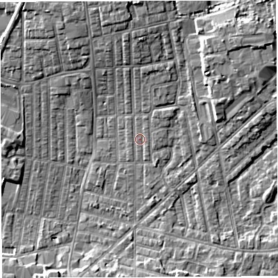 Shaded relief map of the ground around WN71NP, computed from Environment Agency LiDAR. The ground here sits at about 25 m above sea level and falls 7 m across the surrounding 800 m. Surface water reaching this point runs off ground lying to the north, 2.4 m higher.
