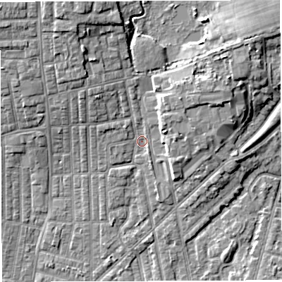 Shaded relief map of the ground around WN71PT, computed from Environment Agency LiDAR. The ground here sits at about 26 m above sea level and falls 8 m across the surrounding 800 m. Surface water reaching this point runs off ground lying to the north-west, 4.3 m higher.