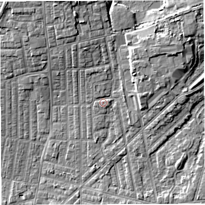 Shaded relief map of the ground around WN71PX, computed from Environment Agency LiDAR. The ground here sits at about 26 m above sea level and falls 8 m across the surrounding 800 m. Surface water reaching this point runs off ground lying to the north, 1.3 m higher.