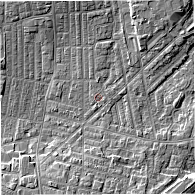 Shaded relief map of the ground around WN71QD, computed from Environment Agency LiDAR. The ground here sits at about 25 m above sea level and falls 7 m across the surrounding 800 m. Surface water reaching this point runs off ground lying to the north-north-east, 4.3 m higher.