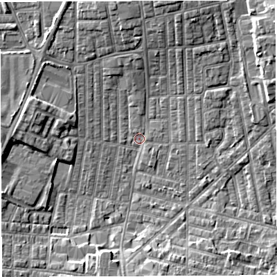Shaded relief map of the ground around WN71QY, computed from Environment Agency LiDAR. The ground here sits at about 24 m above sea level and falls 7 m across the surrounding 800 m. Surface water reaching this point runs off ground lying to the south, 5.4 m higher.