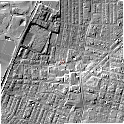 Shaded relief map of the ground around WN71UX, computed from Environment Agency LiDAR. The ground here sits at about 24 m above sea level and falls 6 m across the surrounding 800 m. Surface water reaching this point runs off ground lying to the south-south-east, 5.1 m higher.