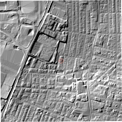 Shaded relief map of the ground around WN71XB, computed from Environment Agency LiDAR. The ground here sits at about 24 m above sea level and falls 6 m across the surrounding 800 m. Surface water reaching this point runs off ground lying to the south-east, 5.9 m higher.