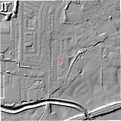 Shaded relief map of the ground around WN73DT, computed from Environment Agency LiDAR. The ground here sits at about 18 m above sea level and falls 13 m across the surrounding 800 m. Surface water reaching this point runs off ground lying to the north, 4.6 m higher.