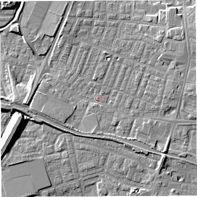 Shaded relief map of the ground around WN74DP, computed from Environment Agency LiDAR. The ground here sits at about 25 m above sea level and falls 11 m across the surrounding 800 m. Surface water reaching this point runs off ground lying to the east-north-east, 4.0 m higher.