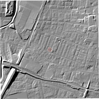 Shaded relief map of the ground around WN74DX, computed from Environment Agency LiDAR. The ground here sits at about 25 m above sea level and falls 14 m across the surrounding 800 m. Surface water reaching this point runs off ground lying to the north-east, 2.3 m higher.