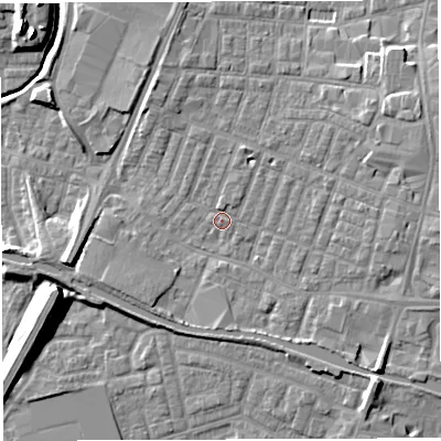 Shaded relief map of the ground around WN74DY, computed from Environment Agency LiDAR. The ground here sits at about 25 m above sea level and falls 11 m across the surrounding 800 m. Surface water reaching this point runs off ground lying to the north-north-east, 2.3 m higher.