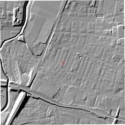 Shaded relief map of the ground around WN74EB, computed from Environment Agency LiDAR. The ground here sits at about 25 m above sea level and falls 14 m across the surrounding 800 m. Surface water reaching this point runs off ground lying to the north, 2.8 m higher.