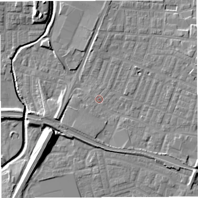 Shaded relief map of the ground around WN74ED, computed from Environment Agency LiDAR. The ground here sits at about 24 m above sea level and falls 15 m across the surrounding 800 m. Surface water reaching this point runs off ground lying to the south-east, 4.6 m higher.