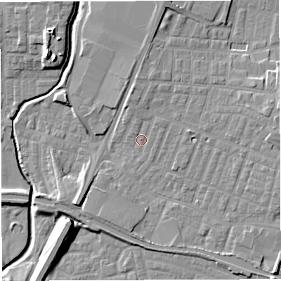 Shaded relief map of the ground around WN74EE, computed from Environment Agency LiDAR. The ground here sits at about 25 m above sea level and falls 15 m across the surrounding 800 m. Surface water reaching this point runs off ground lying to the north, 3.2 m higher.