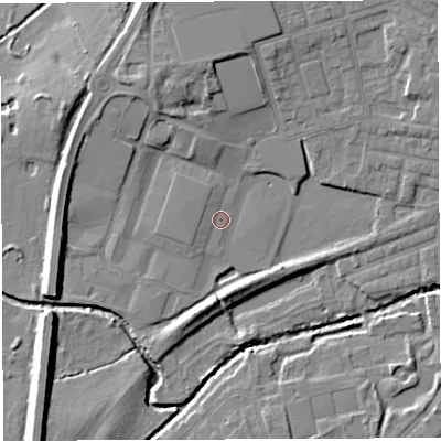 Shaded relief map of the ground around WN74GX, computed from Environment Agency LiDAR. The ground here sits at about 19 m above sea level and falls 10 m across the surrounding 800 m. Surface water reaching this point runs off ground lying to the north-north-west, 7.3 m higher.