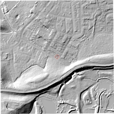 Shaded relief map of the ground around WN74QP, computed from Environment Agency LiDAR. The ground here sits at about 21 m above sea level and falls 16 m across the surrounding 800 m. Surface water reaching this point runs off ground lying to the north-north-east, 9.5 m higher.