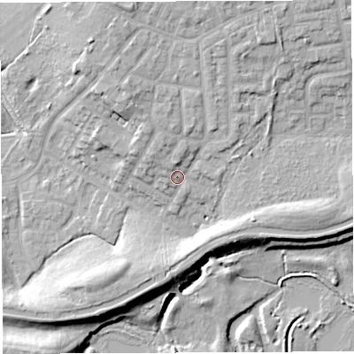 Shaded relief map of the ground around WN74QR, computed from Environment Agency LiDAR. The ground here sits at about 24 m above sea level and falls 15 m across the surrounding 800 m. Surface water reaching this point runs off ground lying to the north-north-east, 7.3 m higher.
