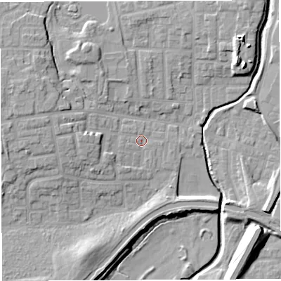 Shaded relief map of the ground around WN74ST, computed from Environment Agency LiDAR. The ground here sits at about 24 m above sea level and falls 15 m across the surrounding 800 m. Surface water reaching this point runs off ground lying to the west, 5.2 m higher.