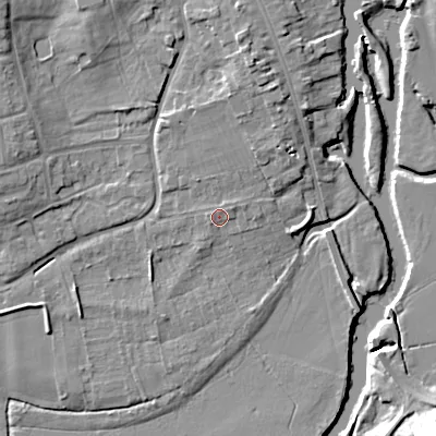 Shaded relief map of the ground around WR101HY, computed from Environment Agency LiDAR. The ground here sits at about 18 m above sea level and falls 14 m across the surrounding 800 m. Surface water reaching this point runs off ground lying to the north, 2.6 m higher.