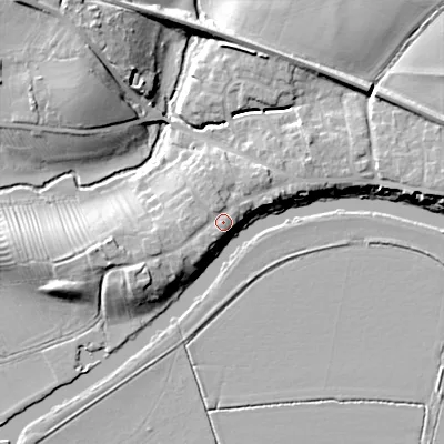 Shaded relief map of the ground around WR102JD, computed from Environment Agency LiDAR. The ground here sits at about 23 m above sea level and falls 15 m across the surrounding 800 m. Surface water reaching this point runs off ground lying to the north-north-west, 1.3 m higher.