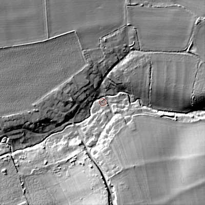 Shaded relief map of the ground around WR103LG, computed from Environment Agency LiDAR. The ground here sits at about 25 m above sea level and falls 25 m across the surrounding 800 m. Surface water reaching this point runs off ground lying to the south, 23.3 m higher.