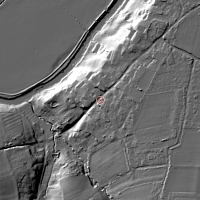 Shaded relief map of the ground around WR103NB, computed from Environment Agency LiDAR. The ground here sits at about 35 m above sea level and falls 27 m across the surrounding 800 m. Surface water reaching this point runs off ground lying to the east, 10.4 m higher.